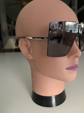 MaxMara Shield Sunglasses in black with grey gradient lenses. Gold hardware